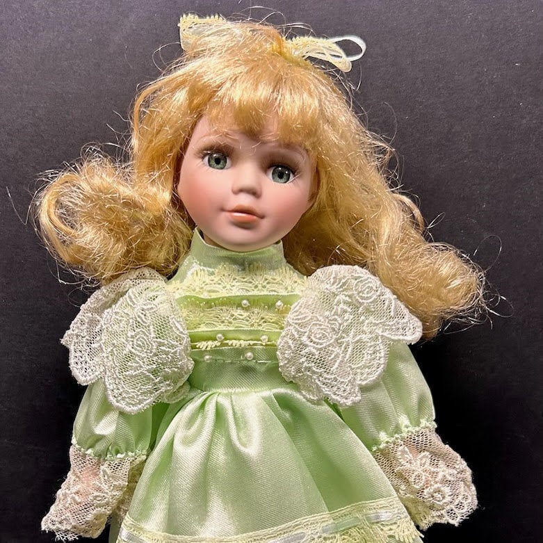 porcelain doll green dress Vintage Victorian Porcelain Doll in a Green Dress Christmas Holiday Do – La  Guanaquita's Closet main image 1